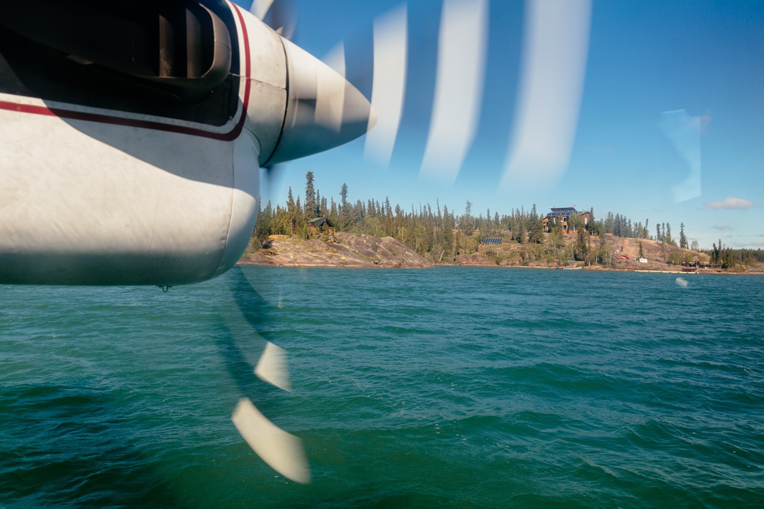 Plane Landing Main Lodge-Summer-Ryan Pyle Productions & Destination Canada-Horizontal